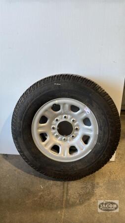 GOOD YEAR LOAD RANGE E TIRE ON 8 BOLT RIM