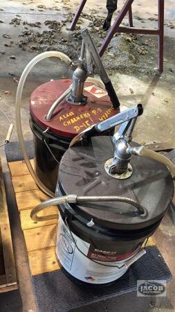 2 OIL PAILS WITH HAND PUMPS