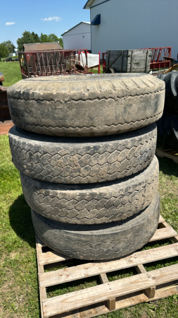 4 -10.00-20 Wagon Tires on 8 Bolt Rims