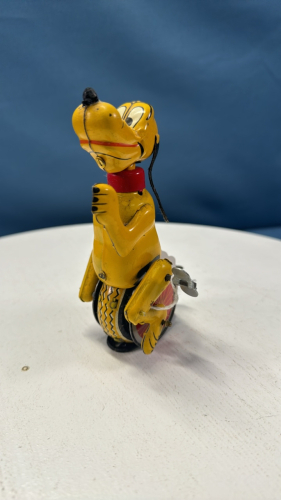 Tin Pluto Wind-Up Toy by Mar