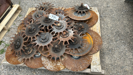 Skid of Coulters & Weeder Wheels