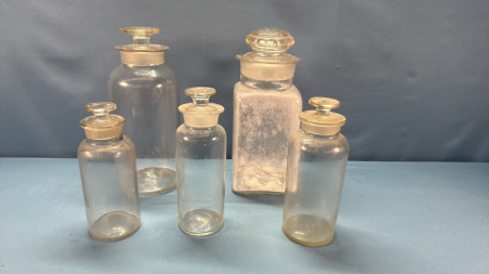 4 Stoppered Apothecary Jars and 1 Counter Jar