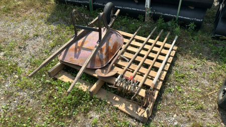 A lot of garden tools and wheelbarrow