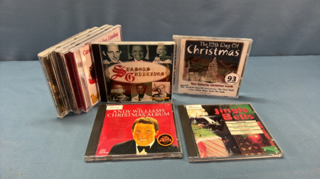 8 Christmas and 2 Folk CDs