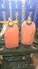 2- Red jerry cans - 2