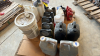 Lot Of part jugs of lubricant - 9