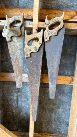 Group of three handsaws