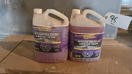 Two jugs of winter washer fluid