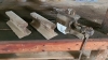 Anvil vice, and two pieces of railroad iron