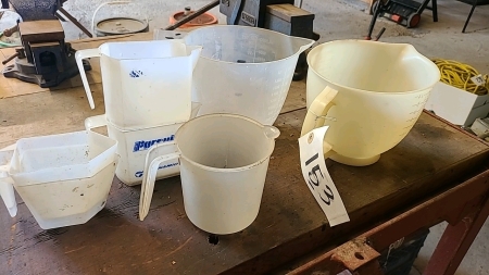 Lot of poly measuring cups