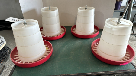 4-unused 6lb poly hanging feeders