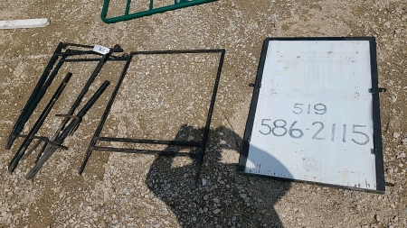 Group of sign posts, frames, and sign