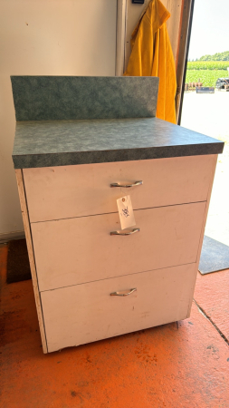 Three drawer cabinet on casters