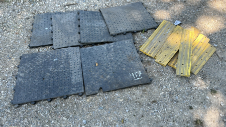 Lot of interlocking rubber work mats and edges