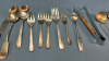 Quantity of Unmatched Cutlery & Serving Pieces - 4