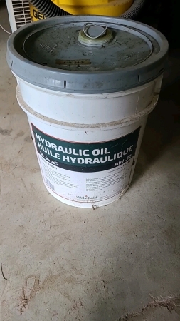 Very Partial Pail of Hydraulic Oil