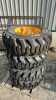 (4) 12-16.5 Skid Steer Tires on New 8 Bolt Rims